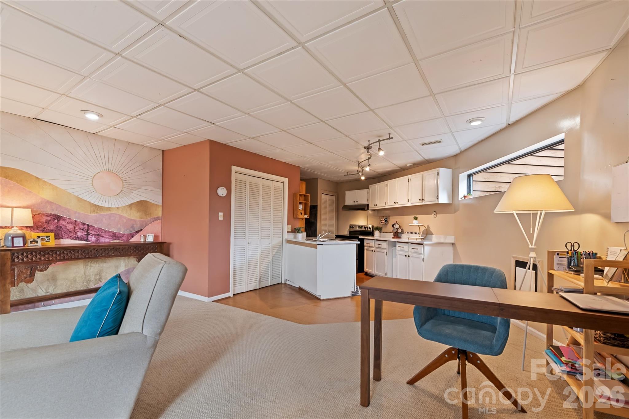 12 Shady Lane Candler, NC 28715 - Photo 13 of 21 a living room with furniture and a wooden floor