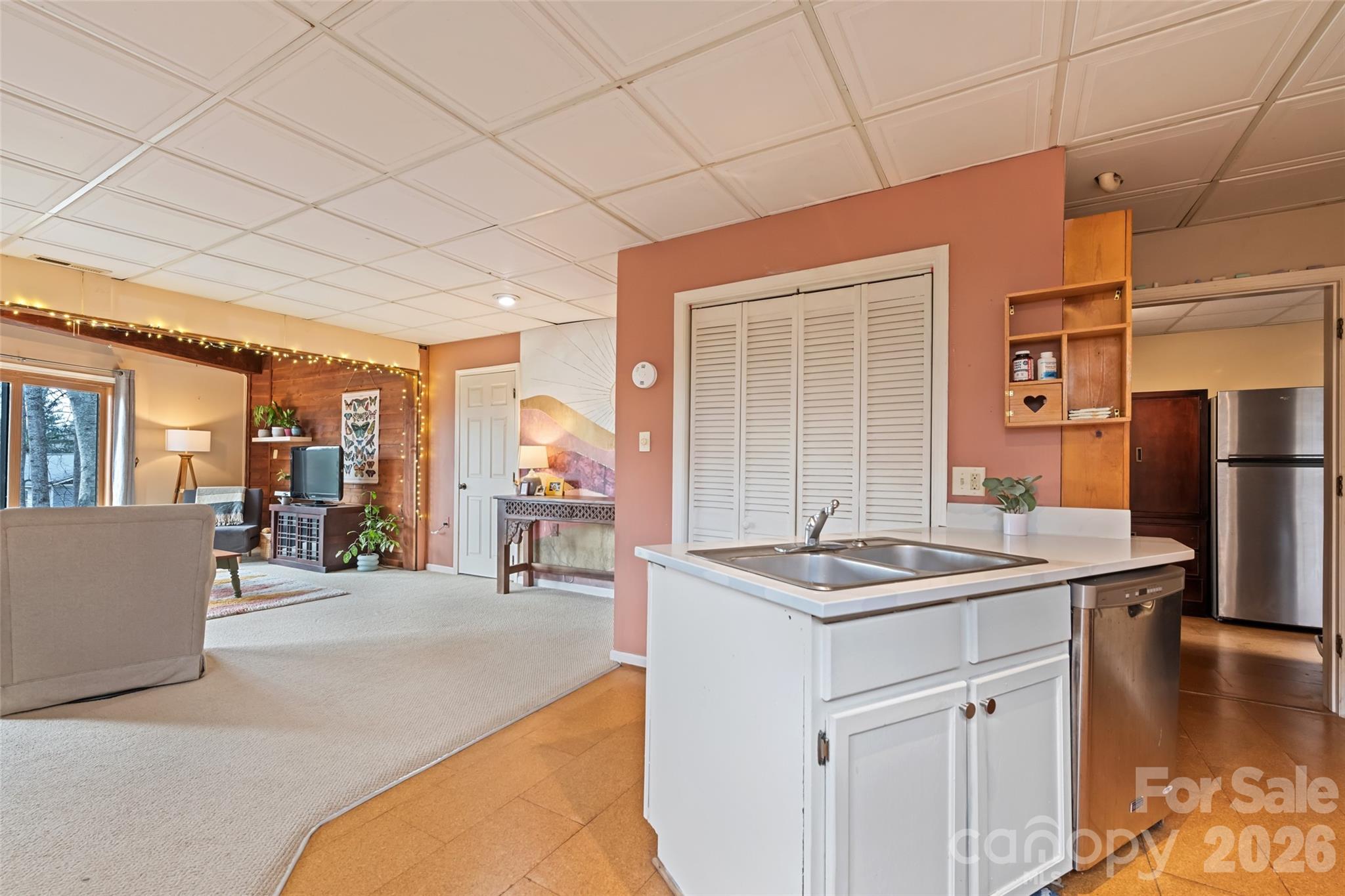 12 Shady Lane Candler, NC 28715 - Photo 14 of 21 a kitchen with stainless steel appliances granite countertop a sink and cabinets
