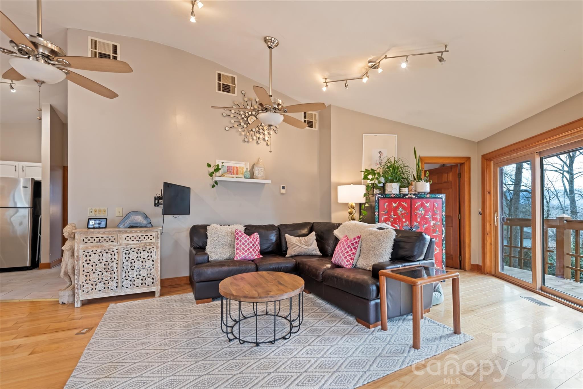 12 Shady Lane Candler, NC 28715 - Photo 3 of 21 a living room with furniture and wooden floor