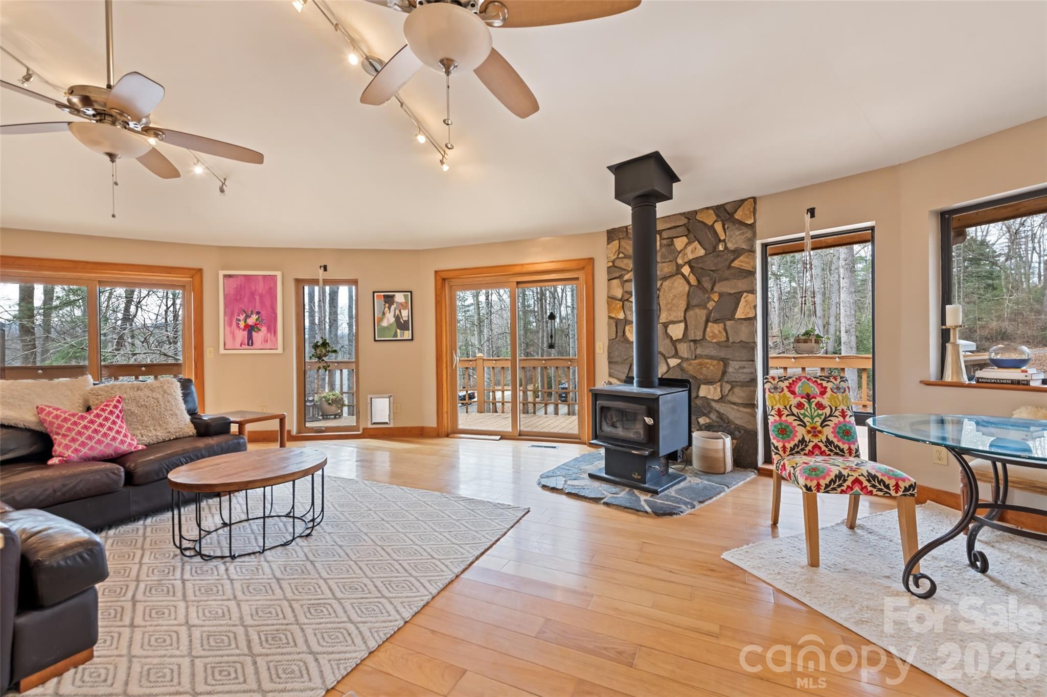12 Shady Lane Candler, NC 28715 - Photo 4 of 21 a living room with furniture and floor to ceiling windows
