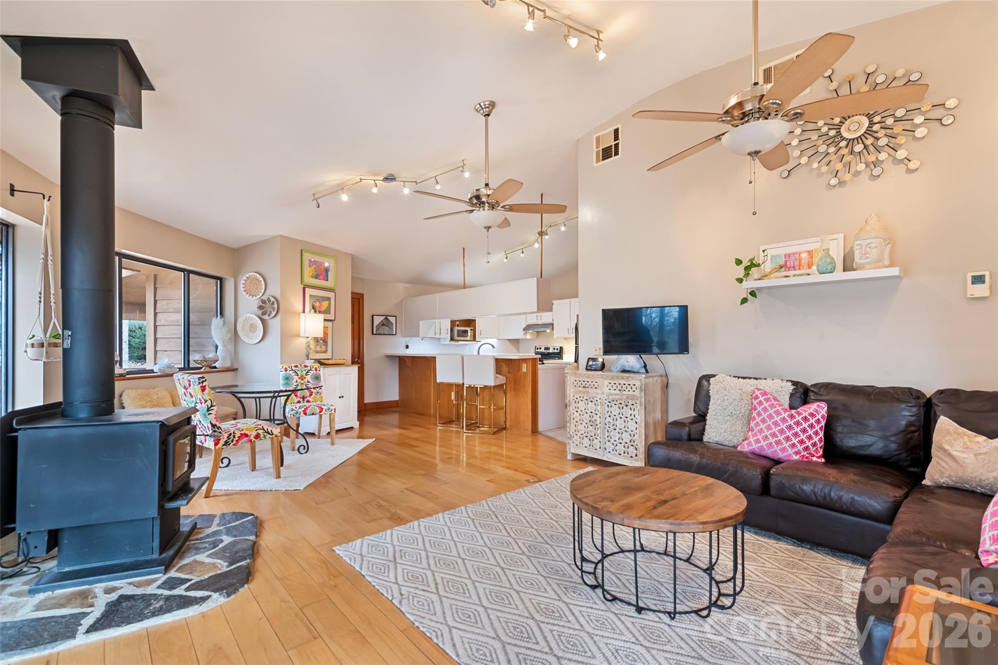 12 Shady Lane Candler, NC 28715 - Photo 5 of 21 a living room with furniture and a fireplace