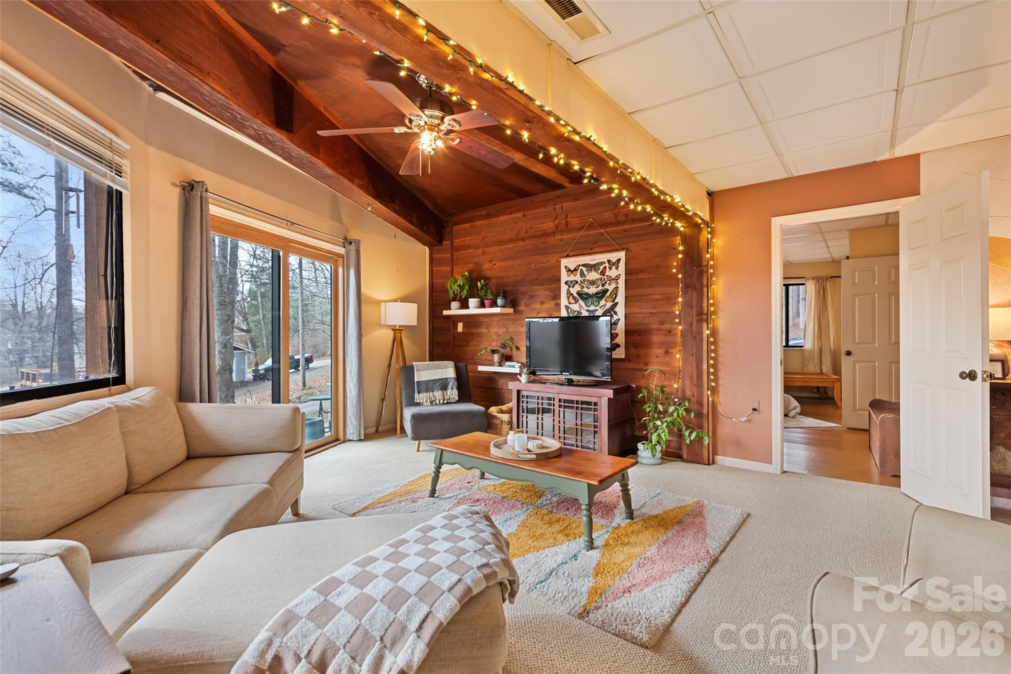 12 Shady Lane Candler, NC 28715 - Photo 10 of 21 a living room with furniture and a large window