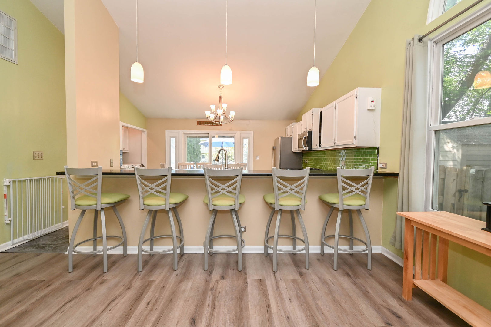 1333 Regency Lane Round Lake, IL 60073 - Photo 10 of 31 a dining room with furniture a window and wooden floor
