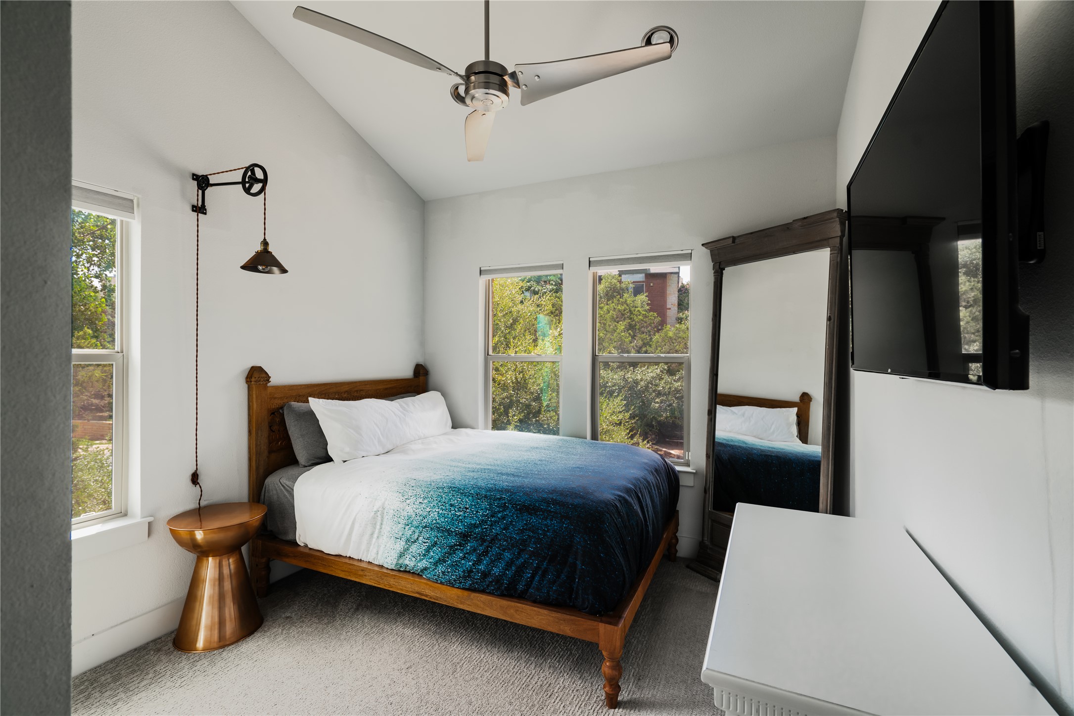 8110 Ranch Road 2222, Unit 36 Austin, TX 78730 - Photo 20 of 31 a bedroom with a bed and a window