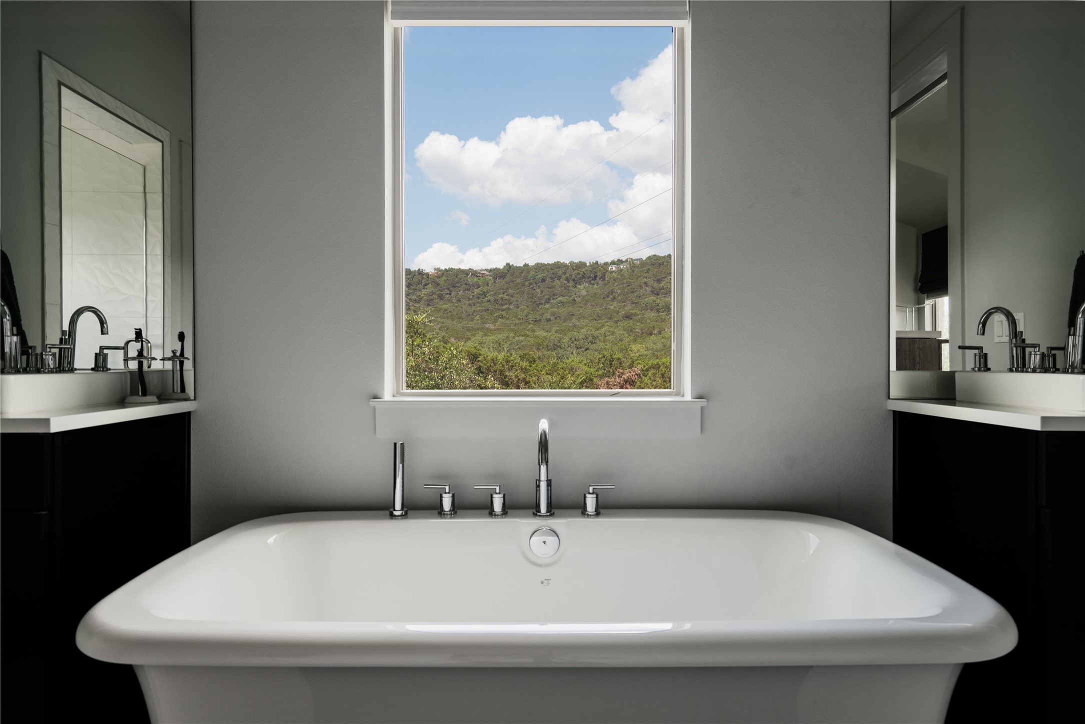 8110 Ranch Road 2222, Unit 36 Austin, TX 78730 - Photo 25 of 31 a bathroom with a granite countertop sink