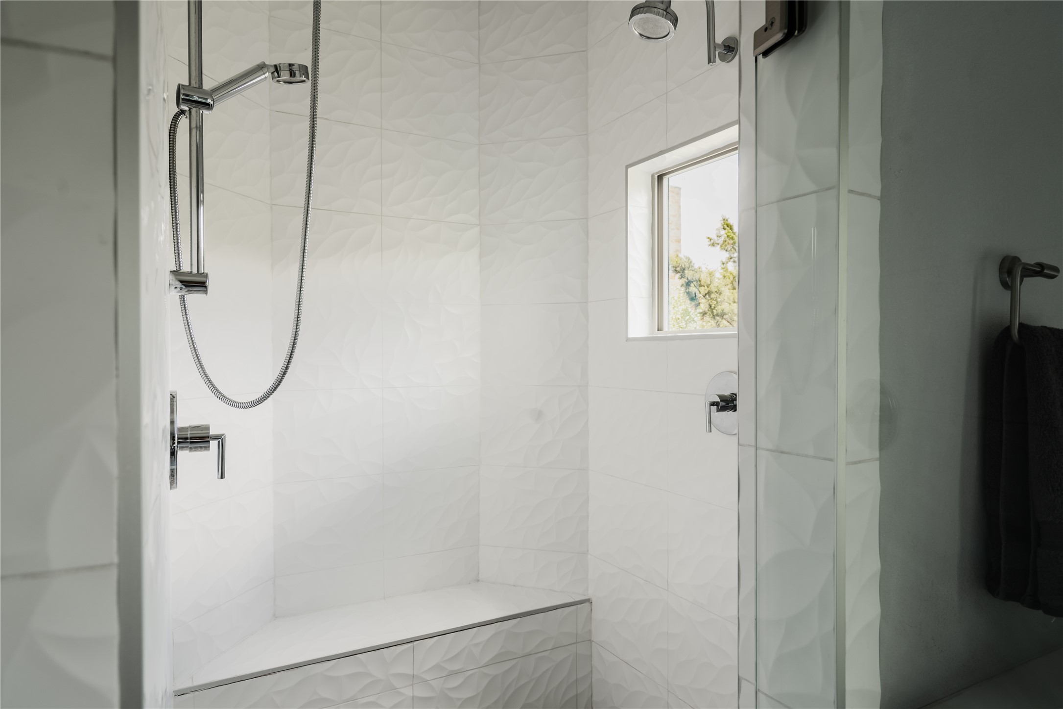 8110 Ranch Road 2222, Unit 36 Austin, TX 78730 - Photo 26 of 31 a bathroom with a glass shower door