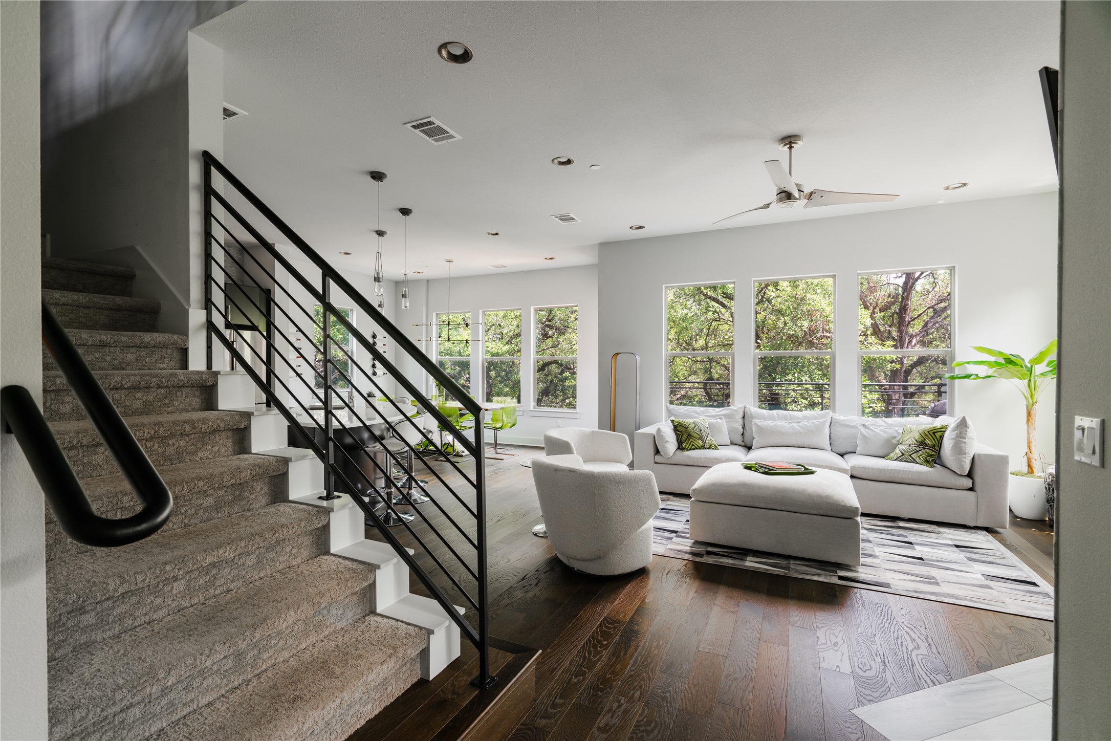 8110 Ranch Road 2222, Unit 36 Austin, TX 78730 - Photo 6 of 31 a living room with furniture or couches and a large window