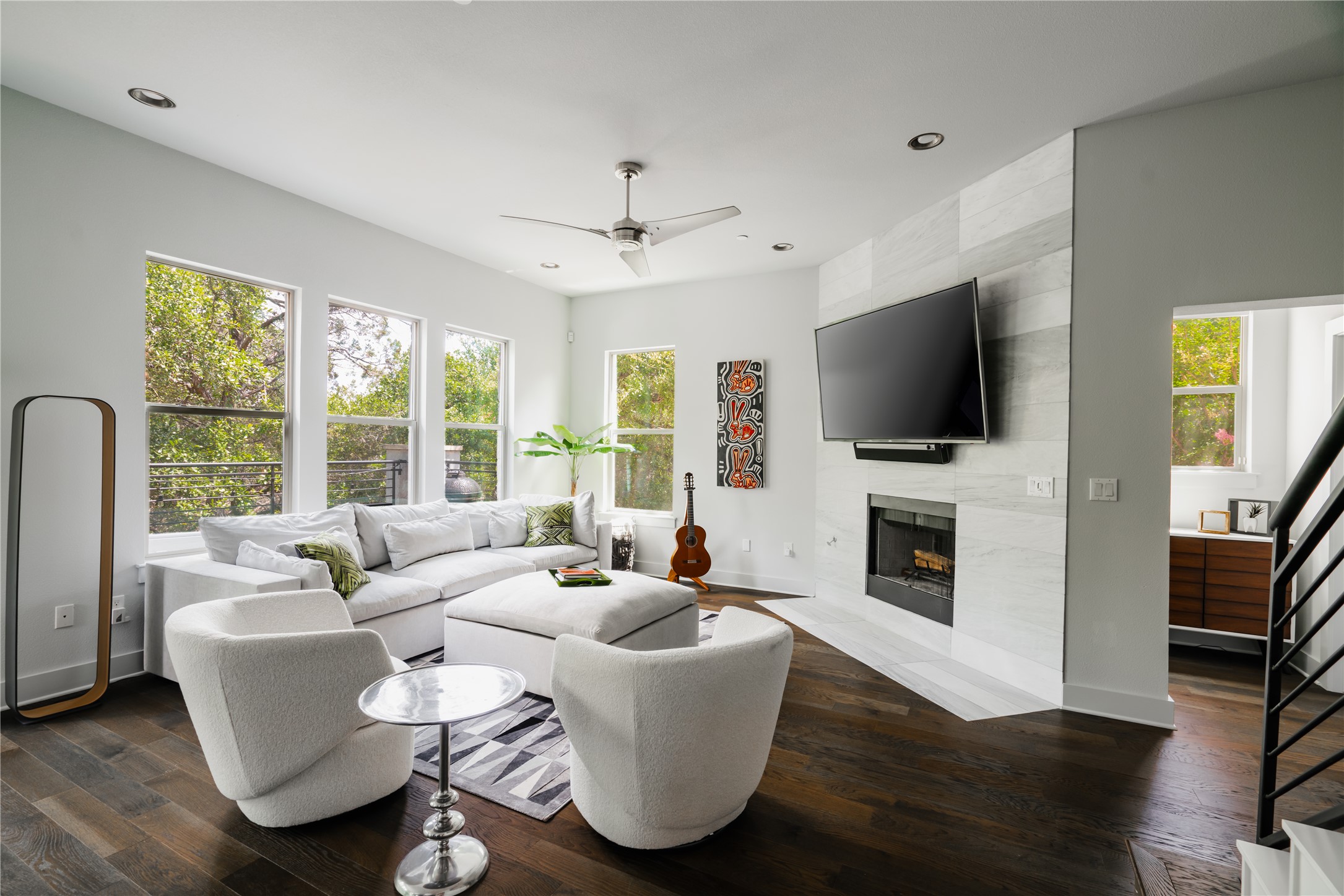 8110 Ranch Road 2222, Unit 36 Austin, TX 78730 - Photo 7 of 31 a living room with furniture and a flat screen tv