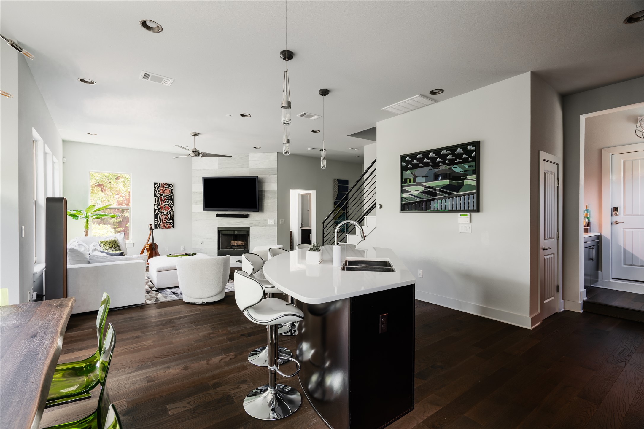 8110 Ranch Road 2222, Unit 36 Austin, TX 78730 - Photo 8 of 31 a living room with dining room and wooden floor