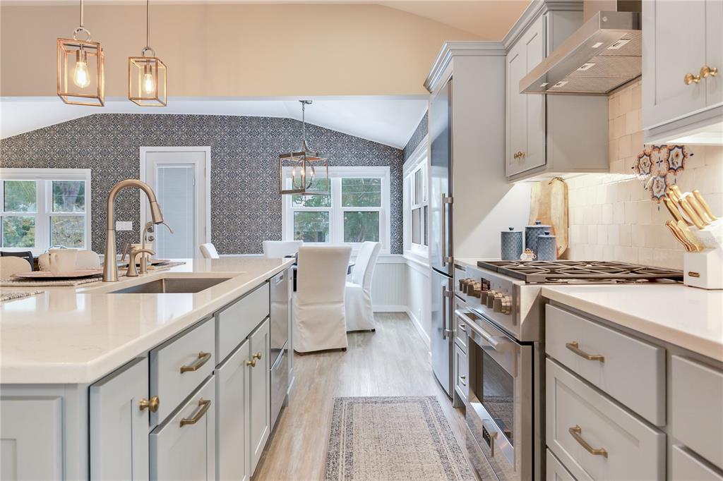 652 Ohio Place Sarasota, FL 34236 - Photo 18 of 61 a kitchen with a sink stove and refrigerator
