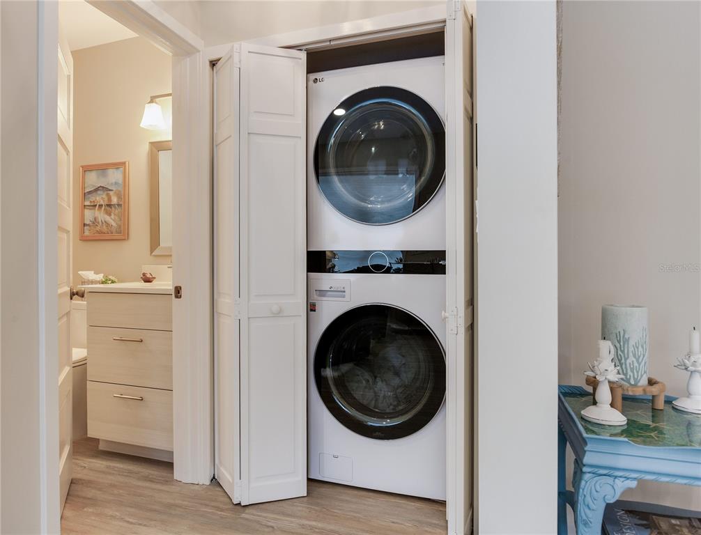 652 Ohio Place Sarasota, FL 34236 - Photo 23 of 61 a view of a hallway with washer and dryer