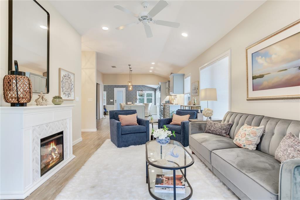 652 Ohio Place Sarasota, FL 34236 - Photo 29 of 61 a living room with furniture and a fireplace