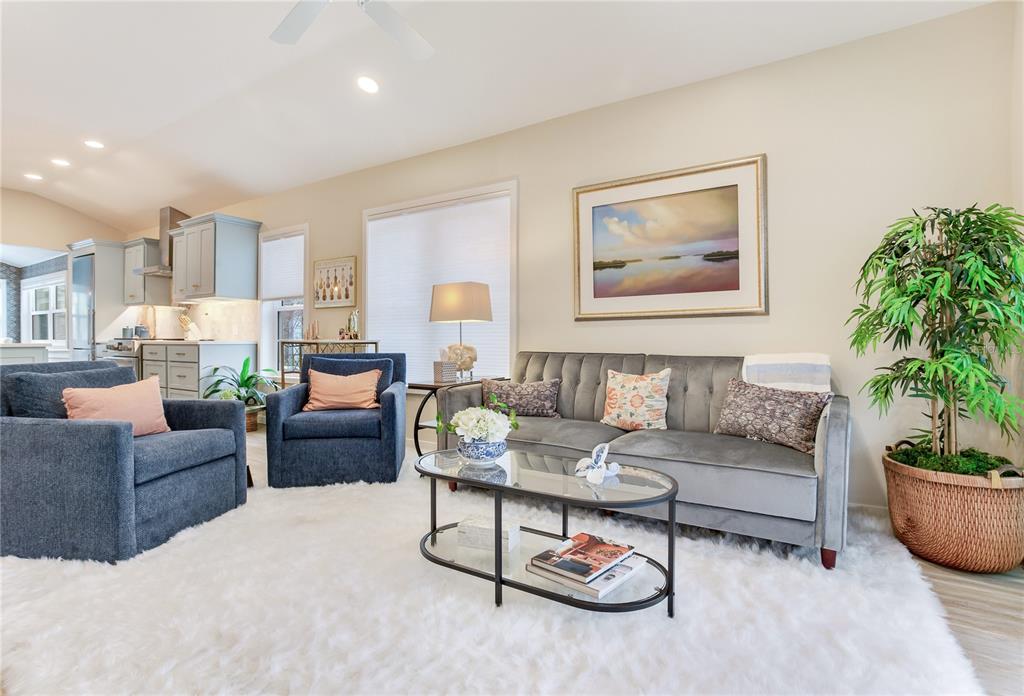 652 Ohio Place Sarasota, FL 34236 - Photo 30 of 61 a living room with furniture potted plant and kitchen view