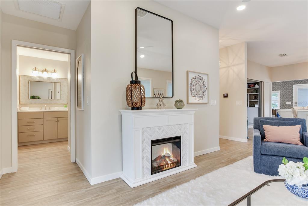 652 Ohio Place Sarasota, FL 34236 - Photo 31 of 61 a living room with furniture and a fireplace