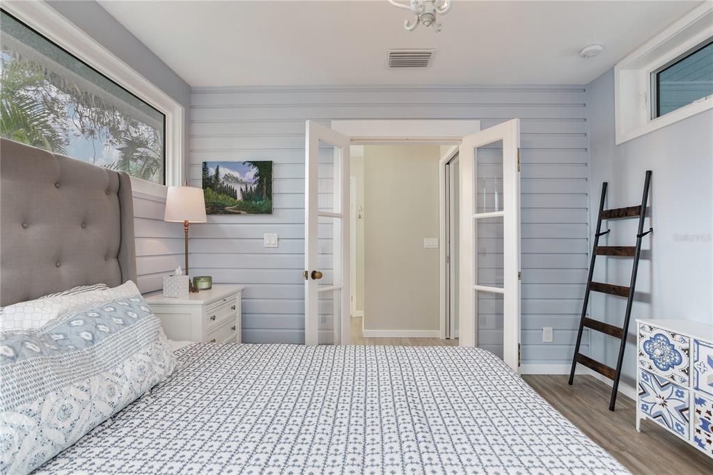 652 Ohio Place Sarasota, FL 34236 - Photo 34 of 61 a bedroom with a bed and a window