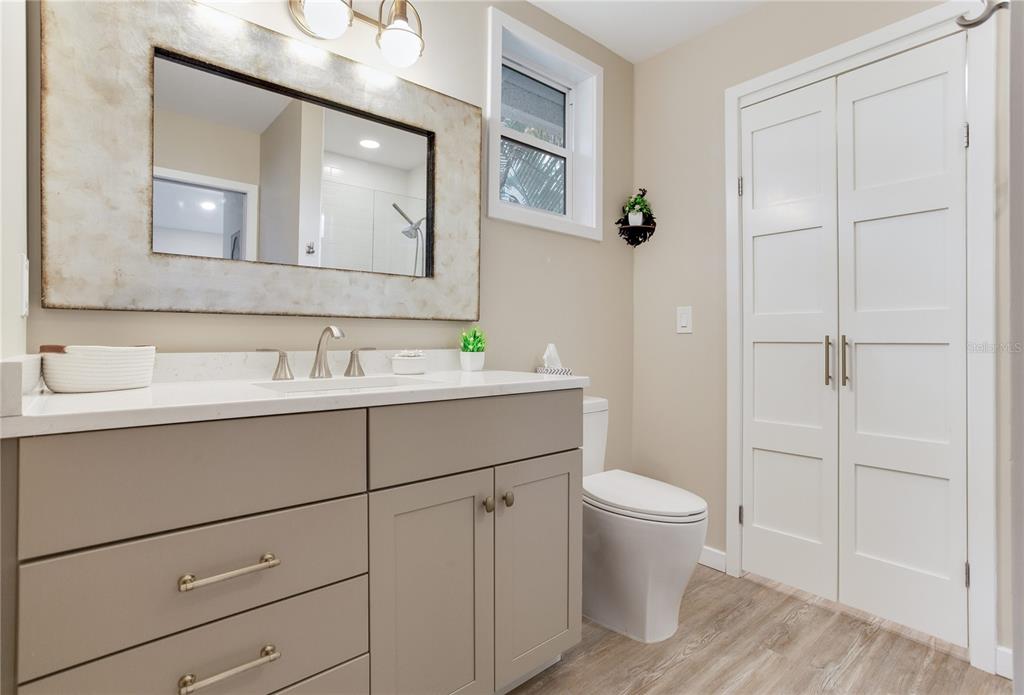 652 Ohio Place Sarasota, FL 34236 - Photo 35 of 61 a bathroom with a sink toilet and vanity