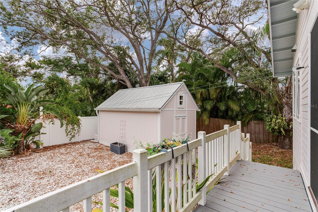 652 Ohio Place Sarasota, FL 34236 - Photo 40 of 61 a view of a wooden house and a yard