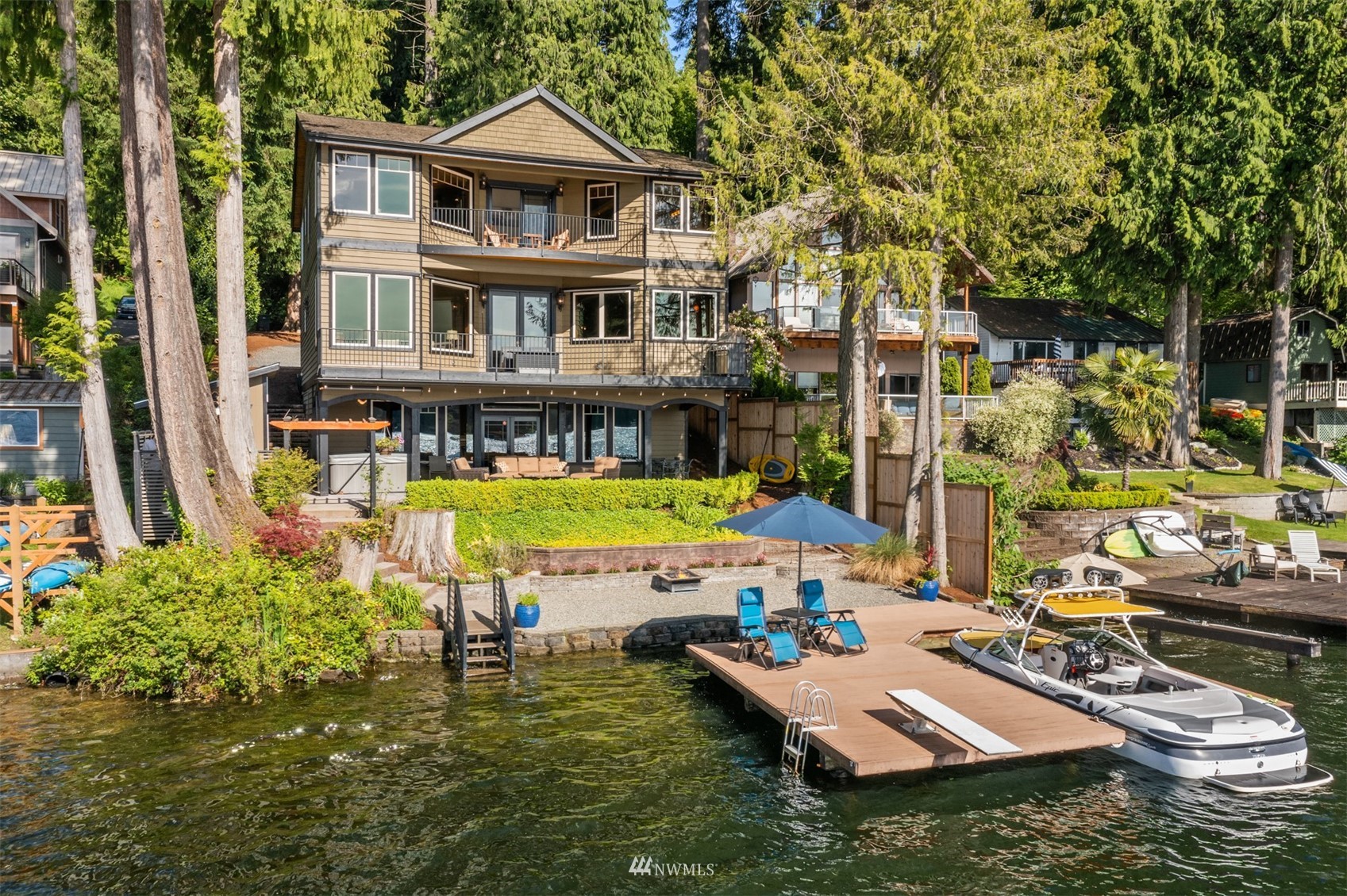 308 South Tulloch Road Snohomish, WA 98290 - Photo 1 of 40 a view of a house with swimming pool and sitting area