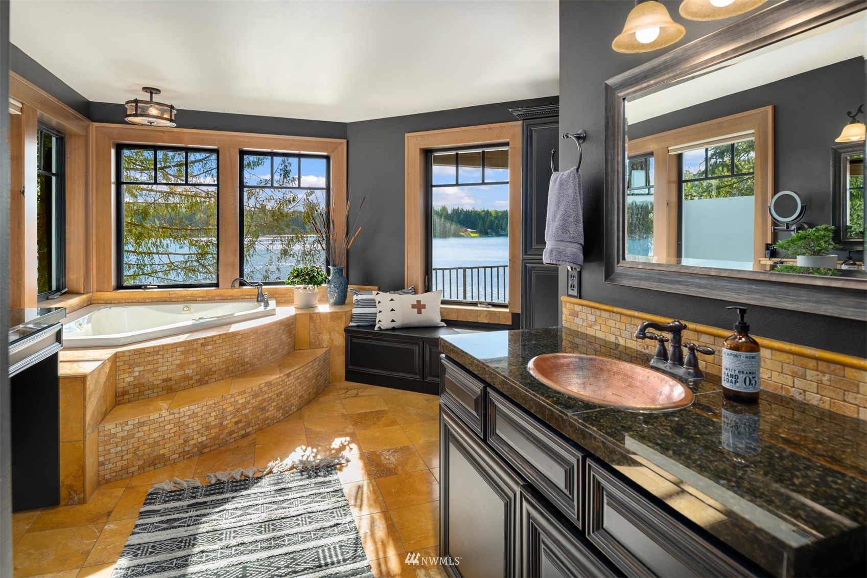 308 South Tulloch Road Snohomish, WA 98290 - Photo 19 of 40 a large kitchen with granite countertop a sink and a window