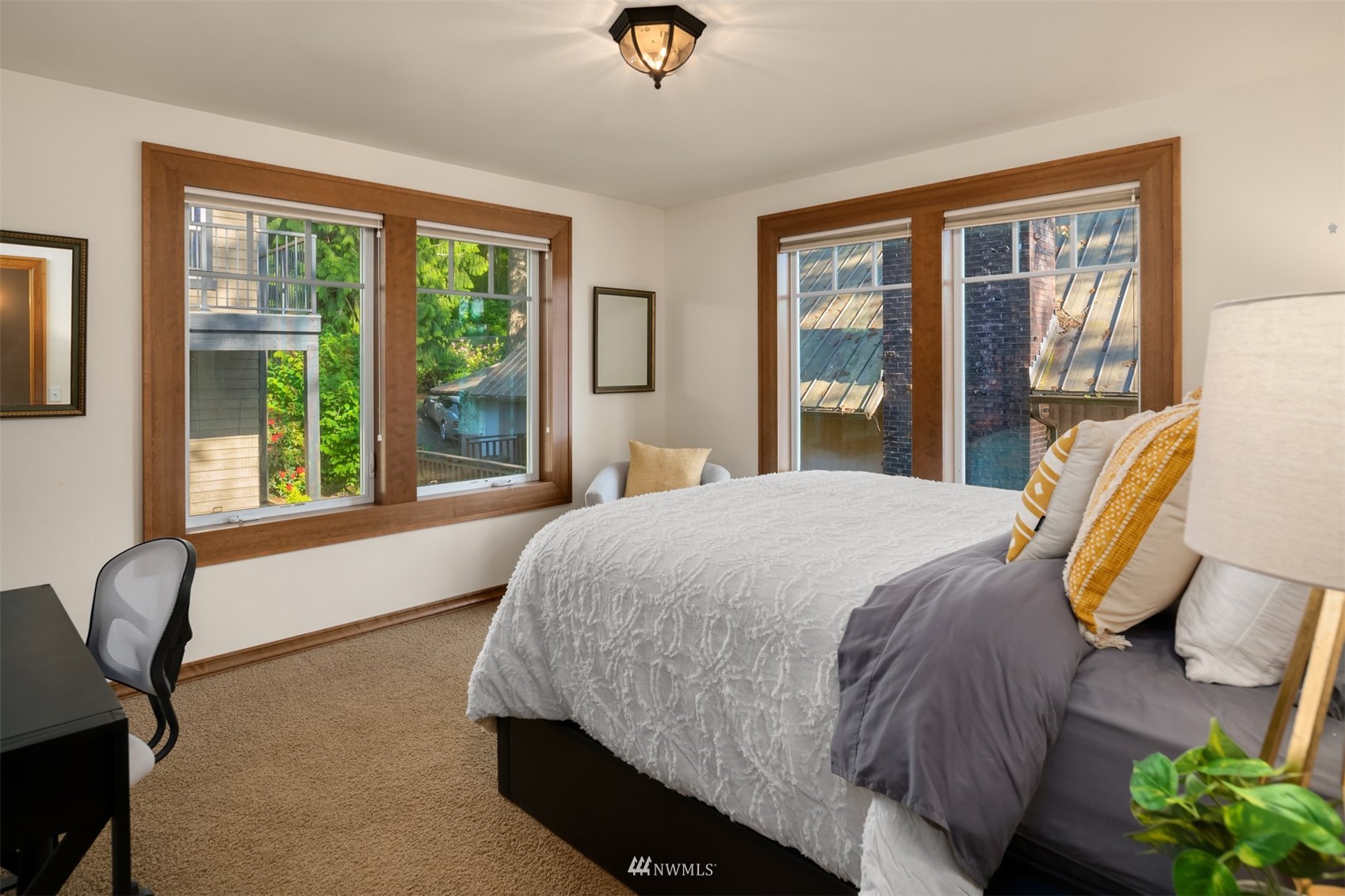 308 South Tulloch Road Snohomish, WA 98290 - Photo 23 of 40 a bedroom with a bed and balcony view