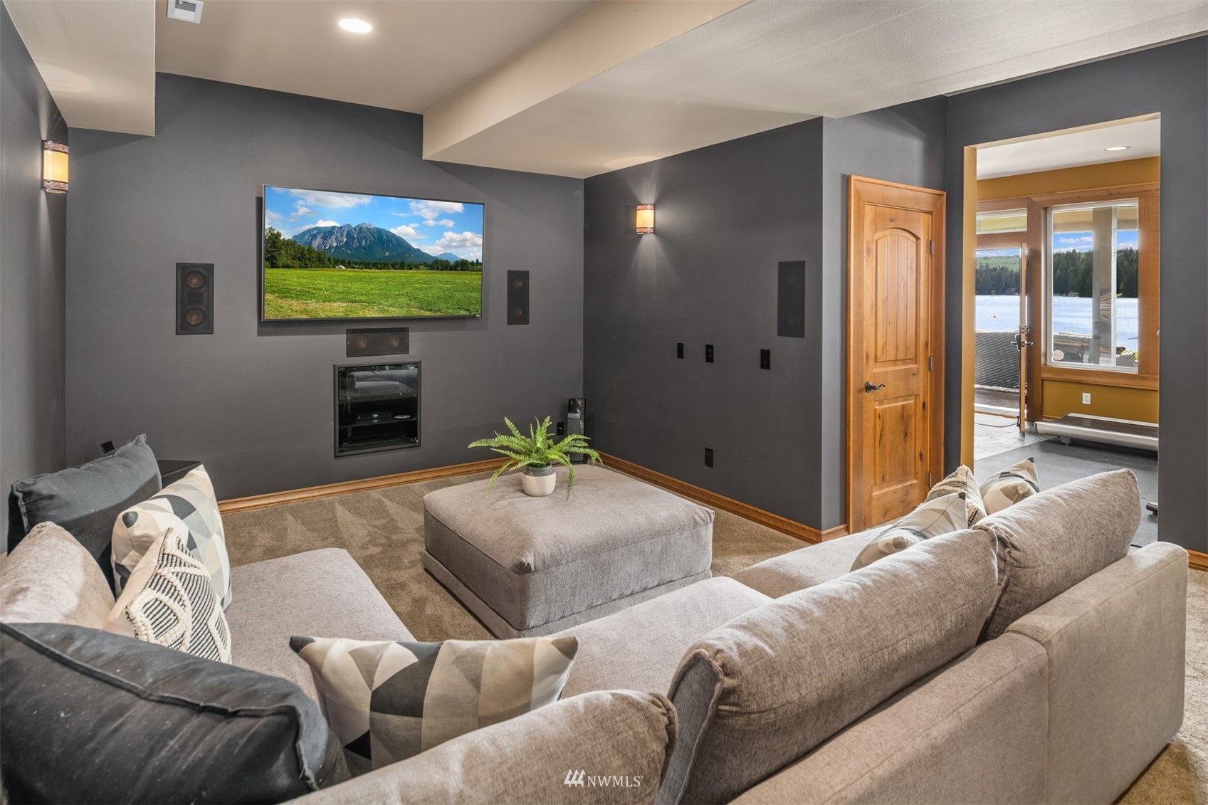 308 South Tulloch Road Snohomish, WA 98290 - Photo 24 of 40 a living room with furniture and a flat screen tv