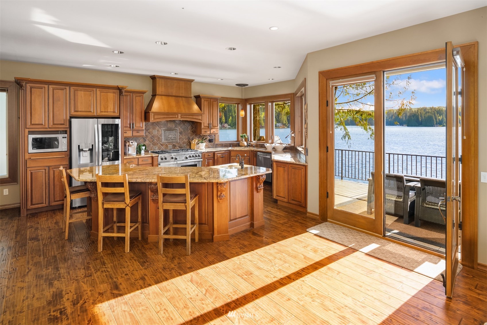 308 South Tulloch Road Snohomish, WA 98290 - Photo 5 of 40 a view of a dining room with furniture window and wooden floor