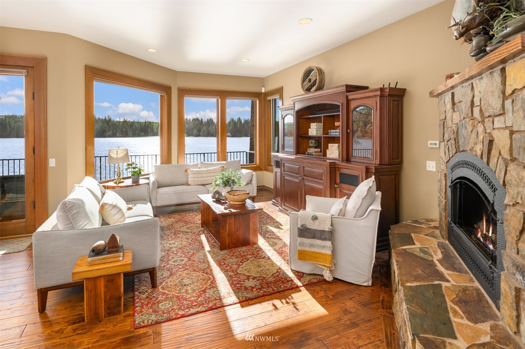 308 South Tulloch Road Snohomish, WA 98290 - Photo 10 of 40 a living room with fireplace furniture and a large window