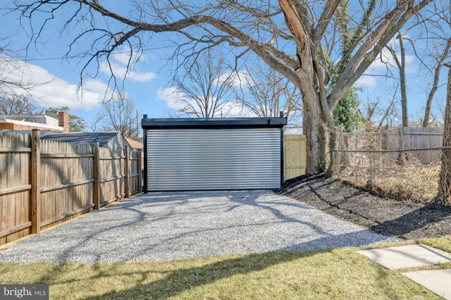 a view of a house with a street
