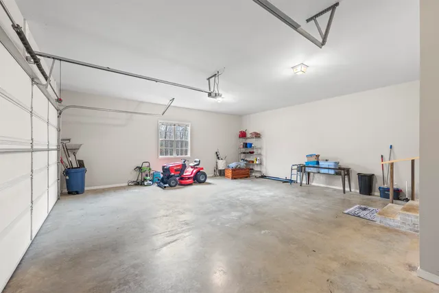 a view of a garage with toys and other equipment