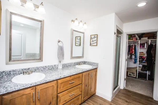 a bathroom with a sink and a mirror