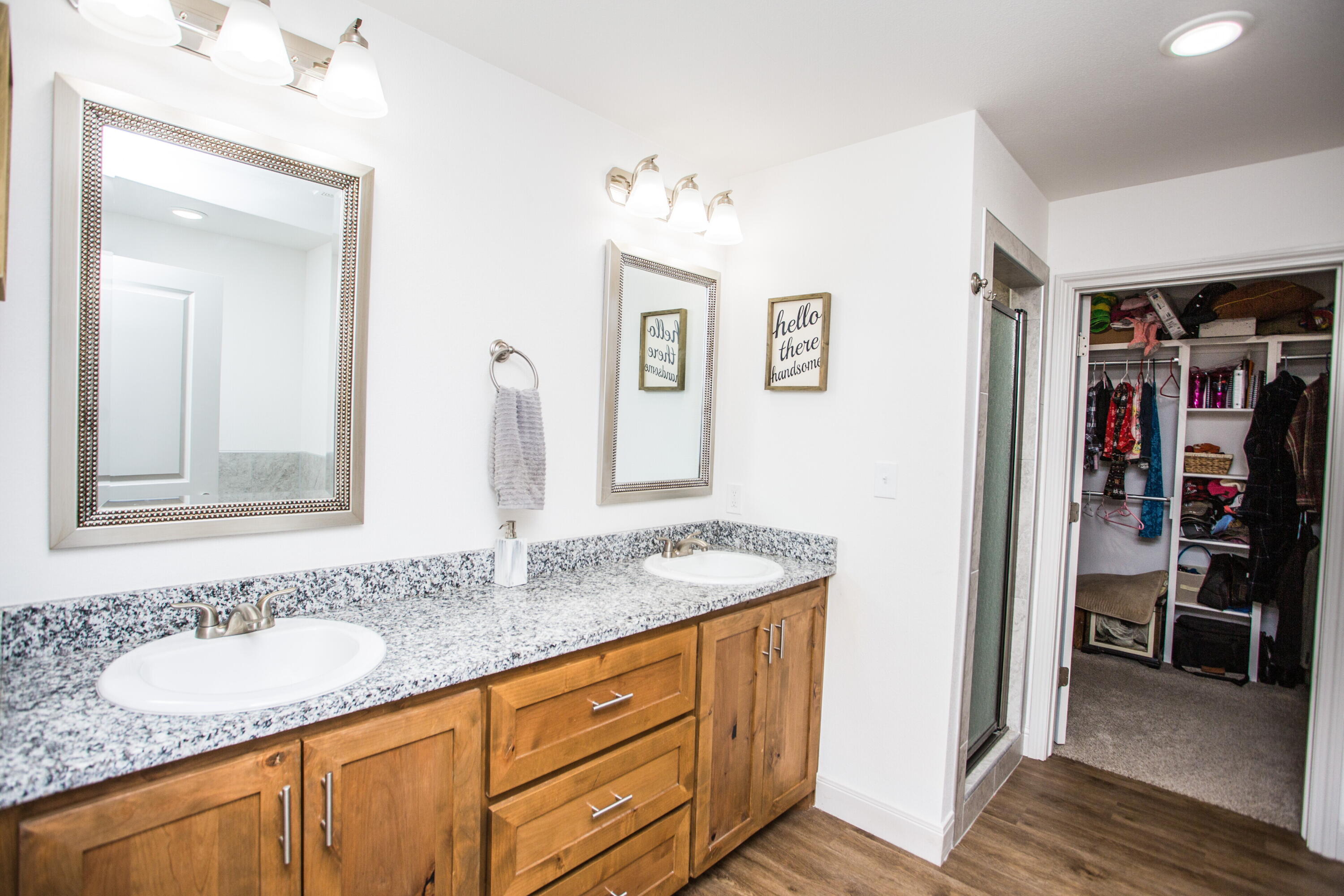 816 North 4th Street Wolfforth, TX 79382 - Photo 15 of 25 a bathroom with a sink and a mirror