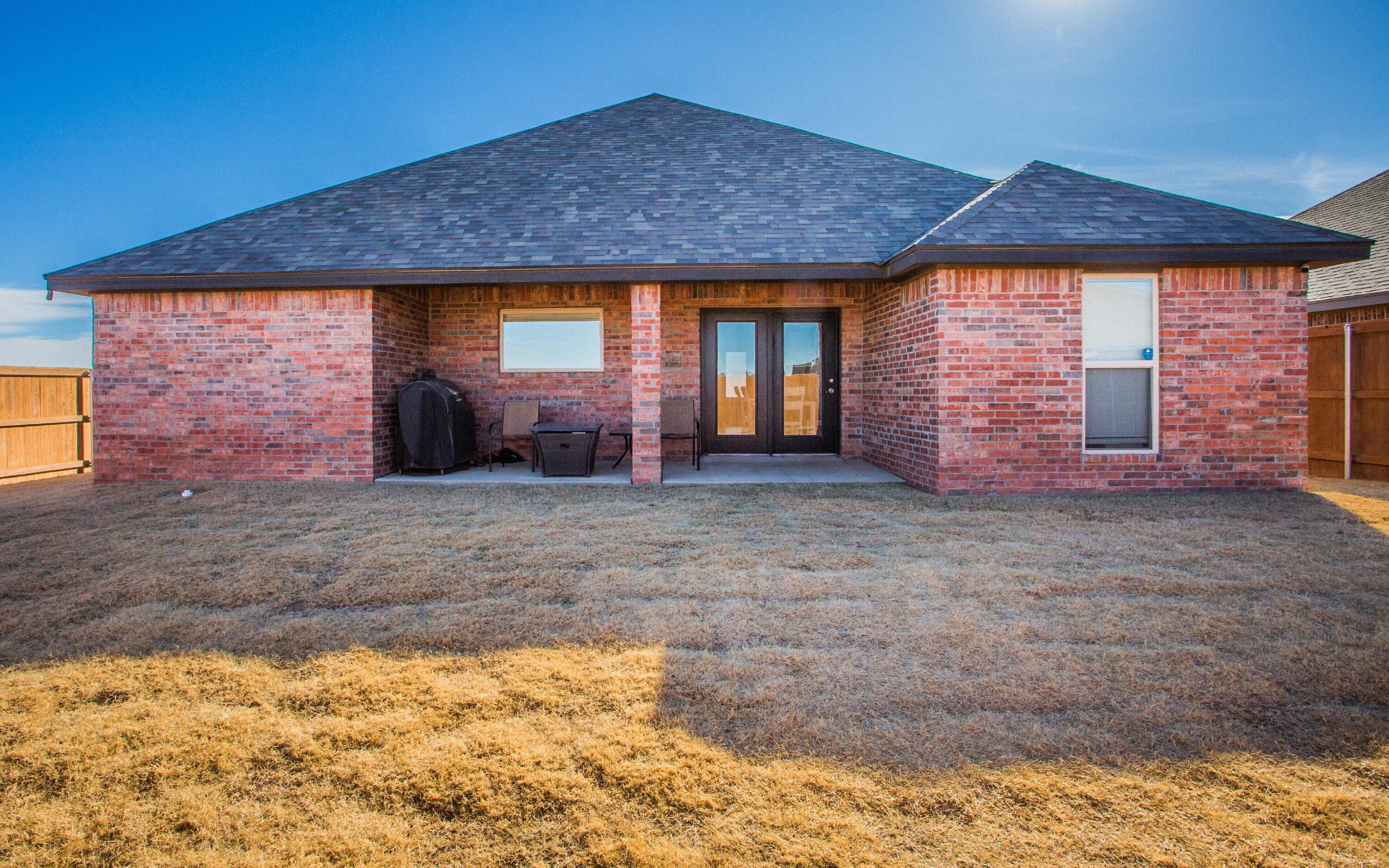 816 North 4th Street Wolfforth, TX 79382 - Photo 24 of 25 a front view of a house with a yard