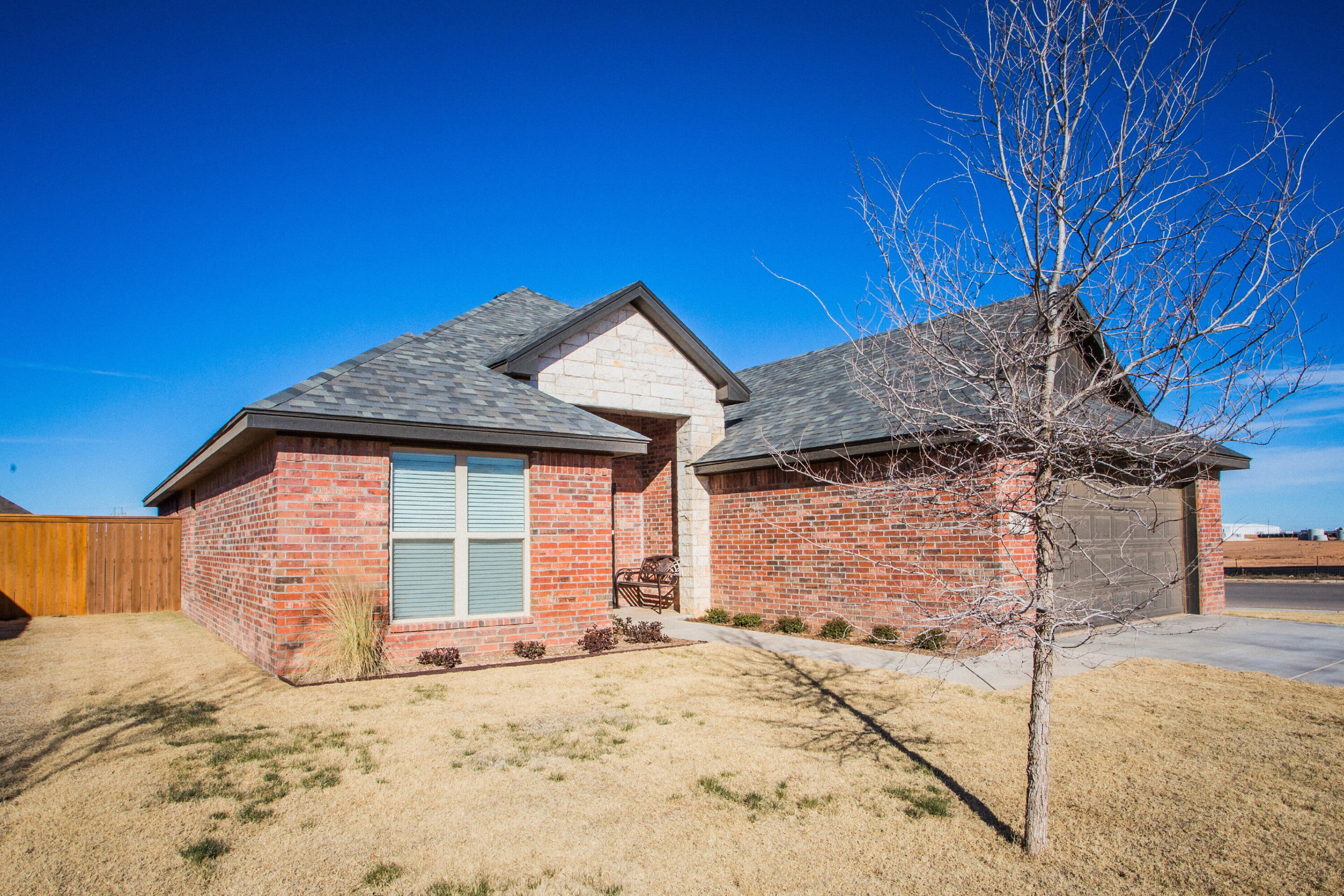 816 North 4th Street Wolfforth, TX 79382 - Photo 3 of 25 a view of a house with a yard