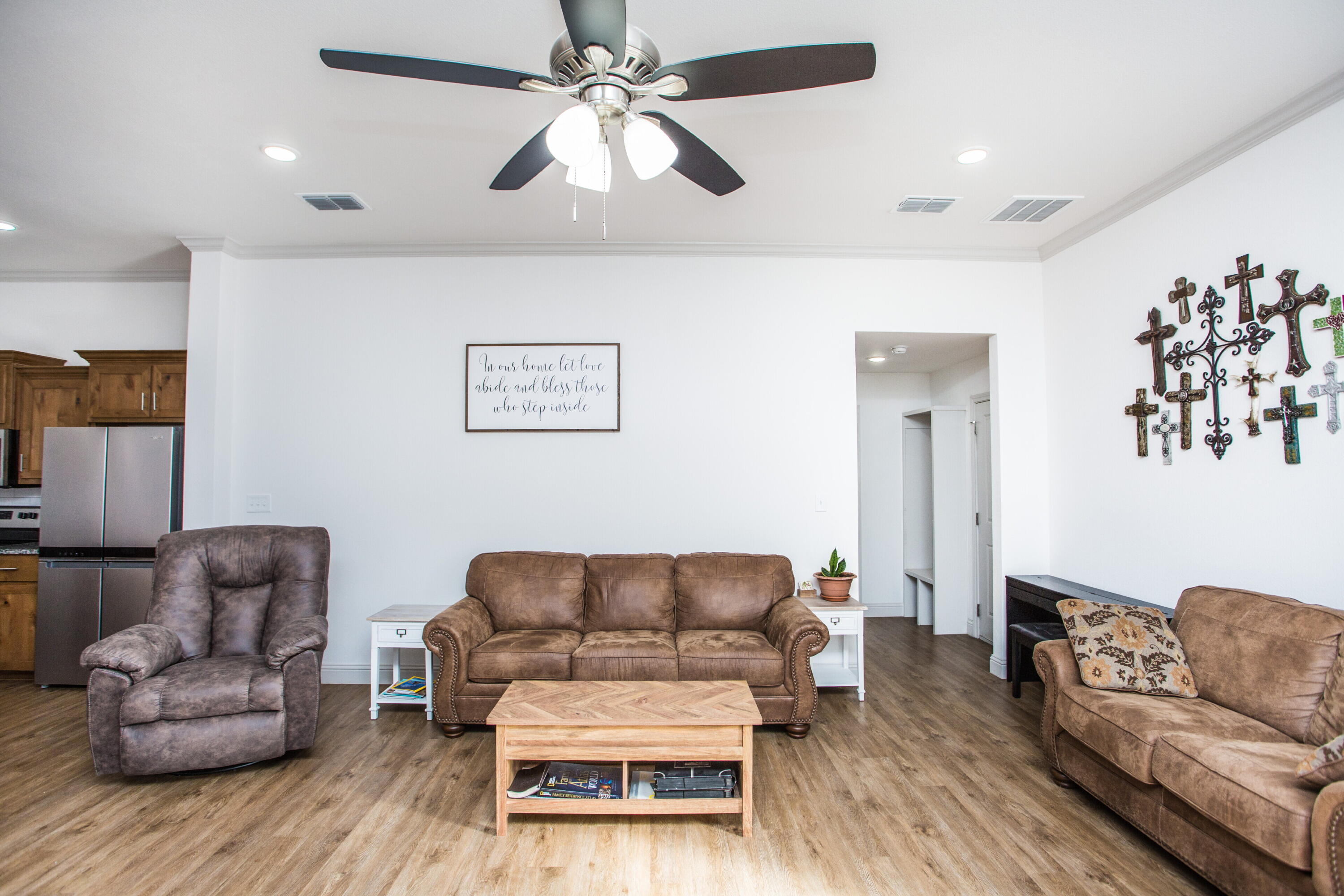 816 North 4th Street Wolfforth, TX 79382 - Photo 9 of 25 a living room with furniture and a wooden floor