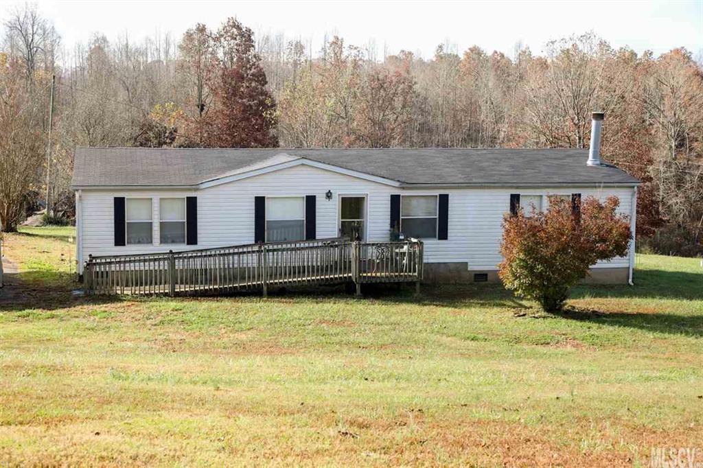 8843 Mull Road Vale, NC 28168 - Photo 1 of 25 a front view of a house with a yard