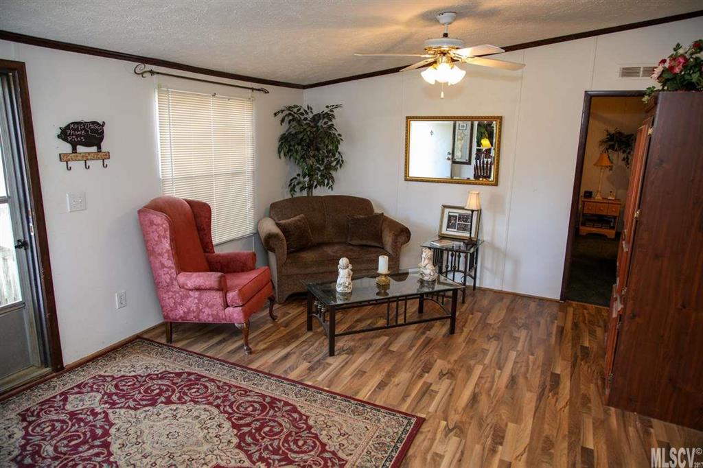 8843 Mull Road Vale, NC 28168 - Photo 21 of 25 a living room with furniture and a window