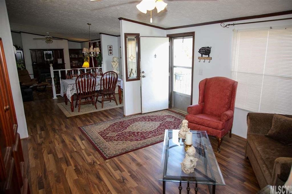 8843 Mull Road Vale, NC 28168 - Photo 22 of 25 a living room with furniture rug and a window