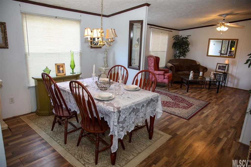 8843 Mull Road Vale, NC 28168 - Photo 25 of 25 a view of a dining room with furniture and chandelier