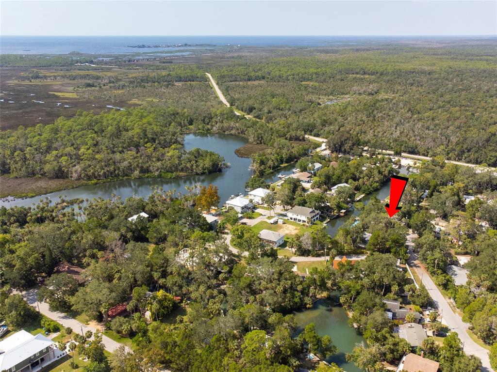 6129 Beacon Point Drive Weeki Wachee, FL 34607 - Photo 25 of 30 a view of lake with city