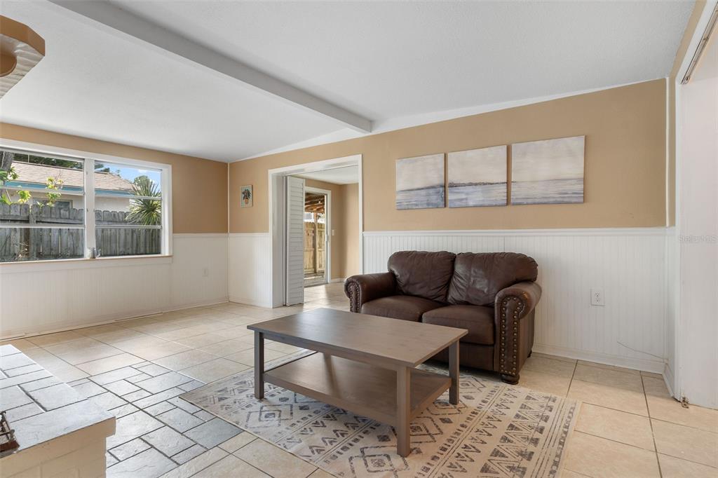 6129 Beacon Point Drive Weeki Wachee, FL 34607 - Photo 5 of 30 a living room with furniture and a window