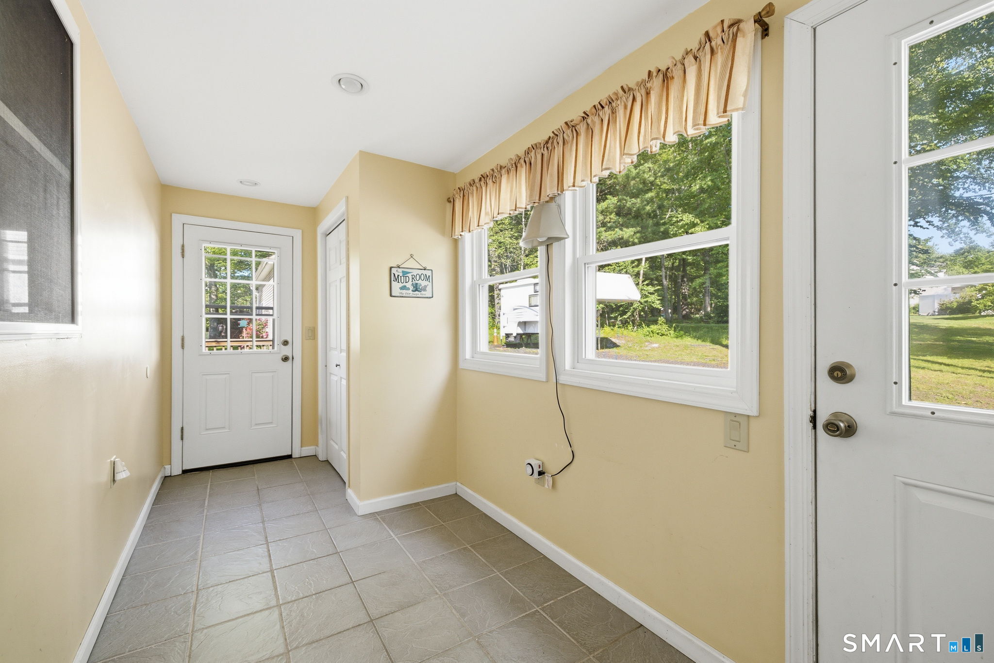 141 Hop River Road Coventry, CT 06238 - Photo 24 of 40 a view of a hallway with a window