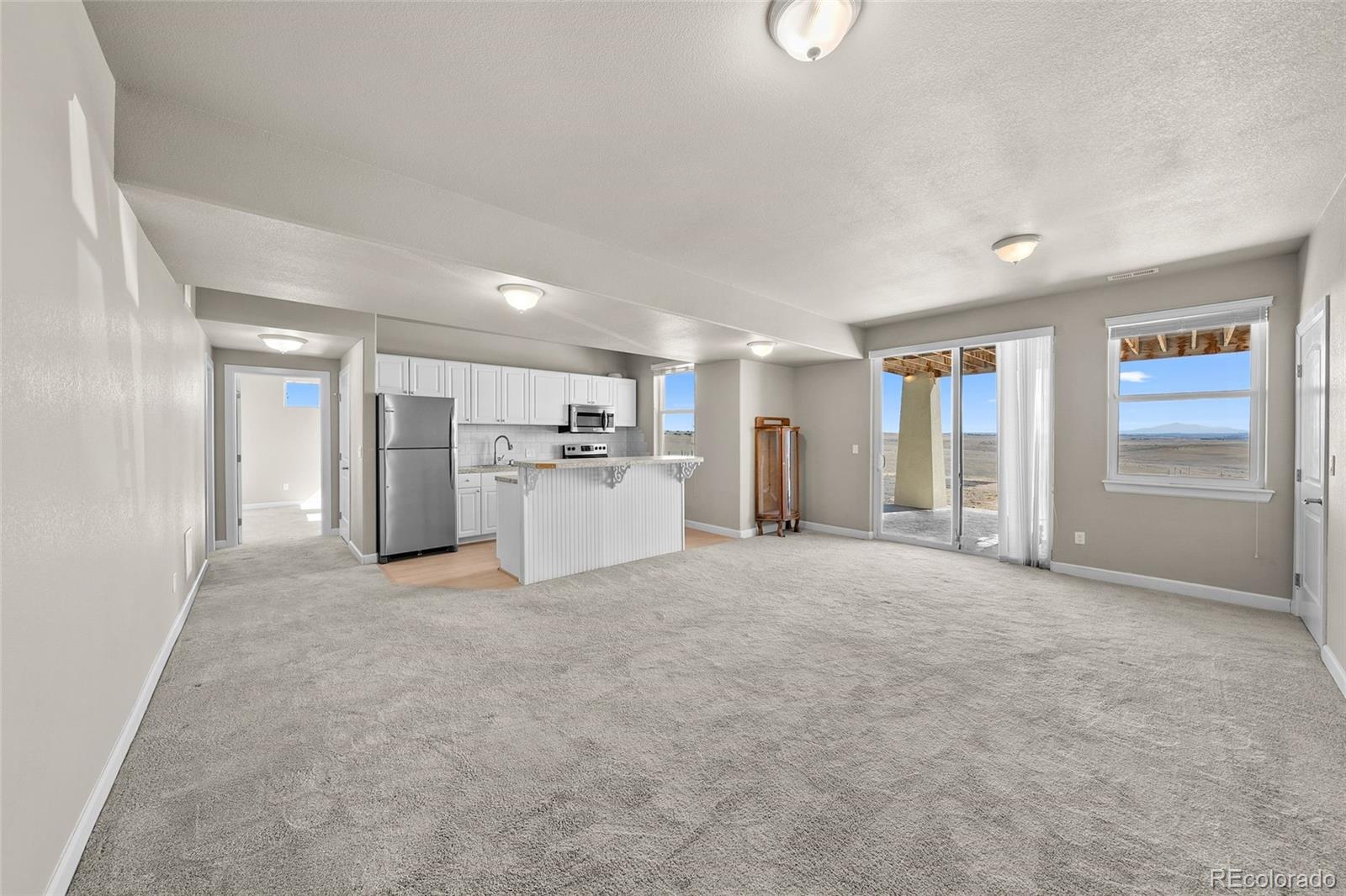 7600 Patrick Trail Elizabeth, CO 80107 - Photo 22 of 45 a view of a livingroom with a sink