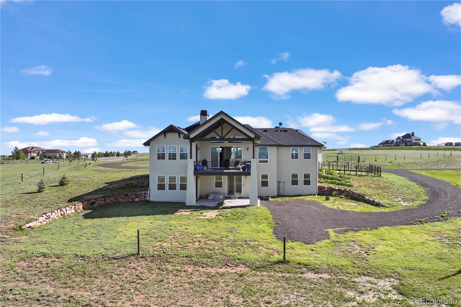7600 Patrick Trail Elizabeth, CO 80107 - Photo 27 of 45 a house view with a garden space