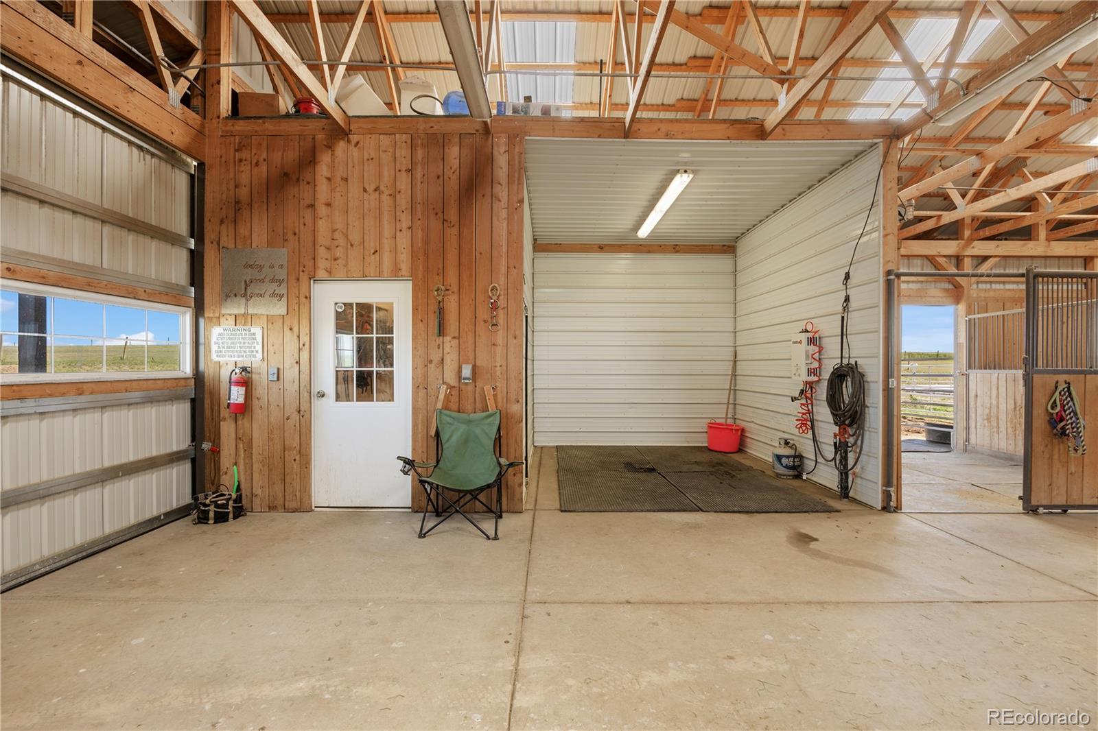 7600 Patrick Trail Elizabeth, CO 80107 - Photo 31 of 45 a view of a utility room with clothes and shoes