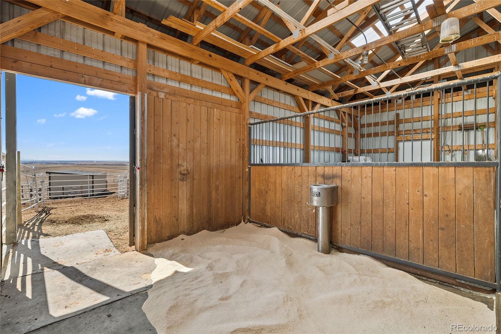 7600 Patrick Trail Elizabeth, CO 80107 - Photo 37 of 45 a view of a hallway with wooden floor