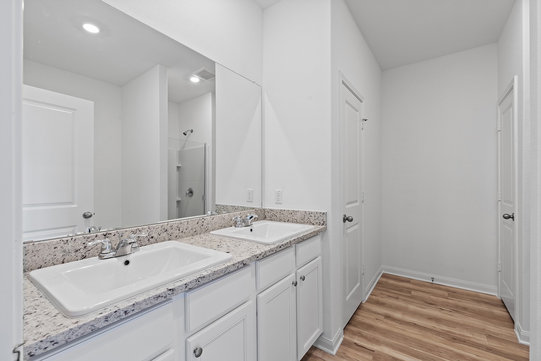 14401 Bonellis Pass Elgin, TX 78621 - Photo 5 of 13 a bathroom with a sink and a mirror