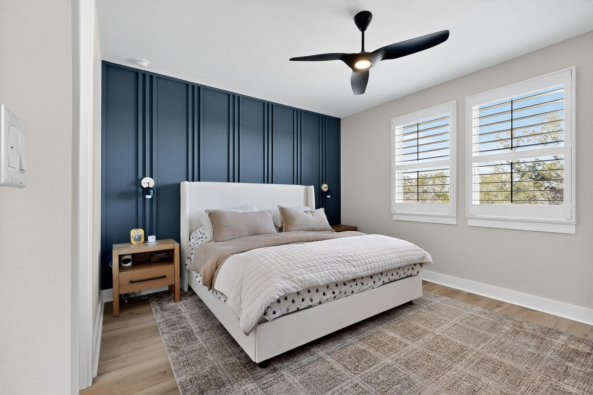 473 Bauer Loop Liberty Hill, TX 78642 - Photo 16 of 38 Primary Bedroom with light wood-style flooring and ceiling fan