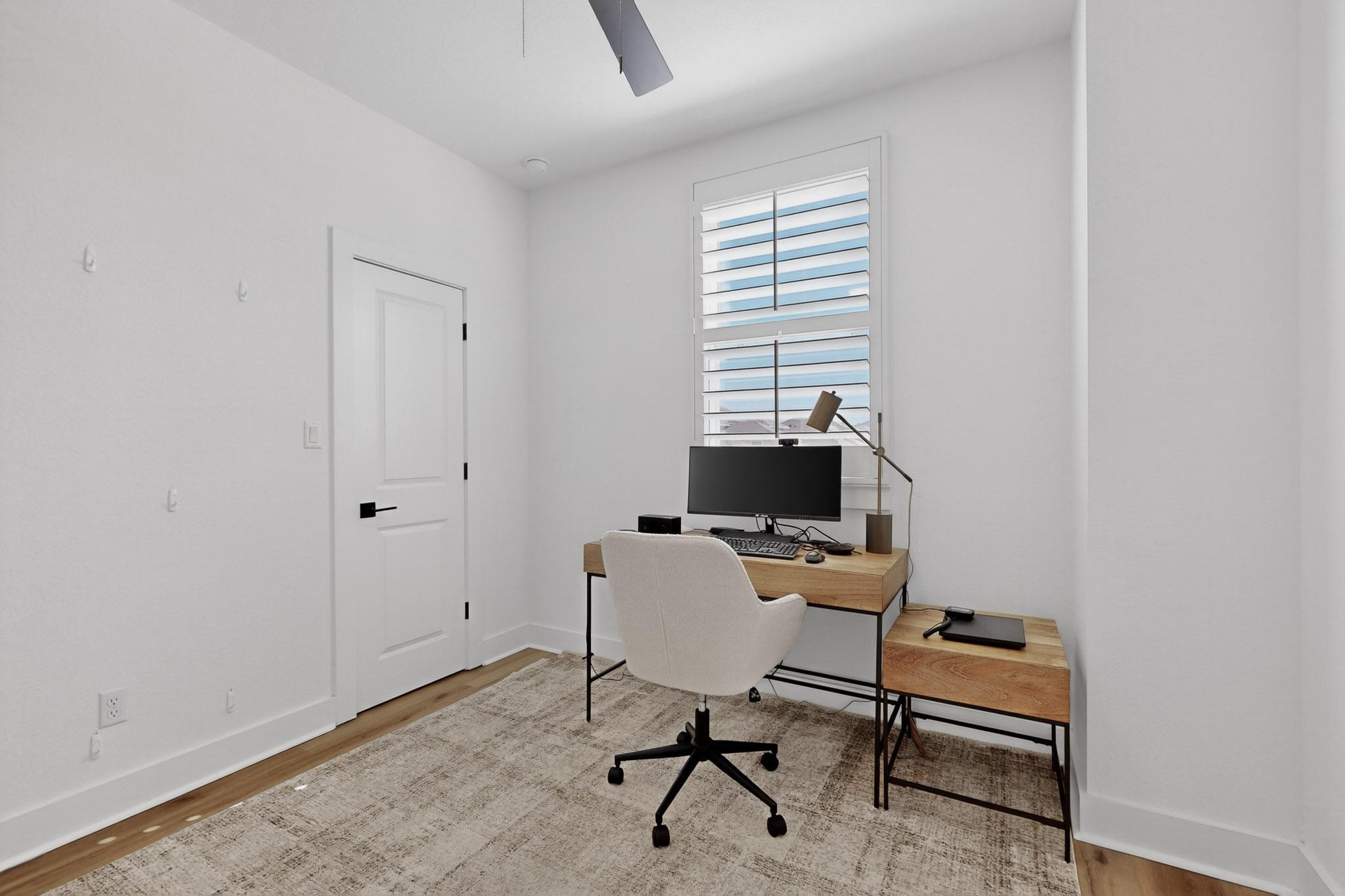 473 Bauer Loop Liberty Hill, TX 78642 - Photo 27 of 38 Bedroom #4 featuring light wood-type flooring and ceiling fan