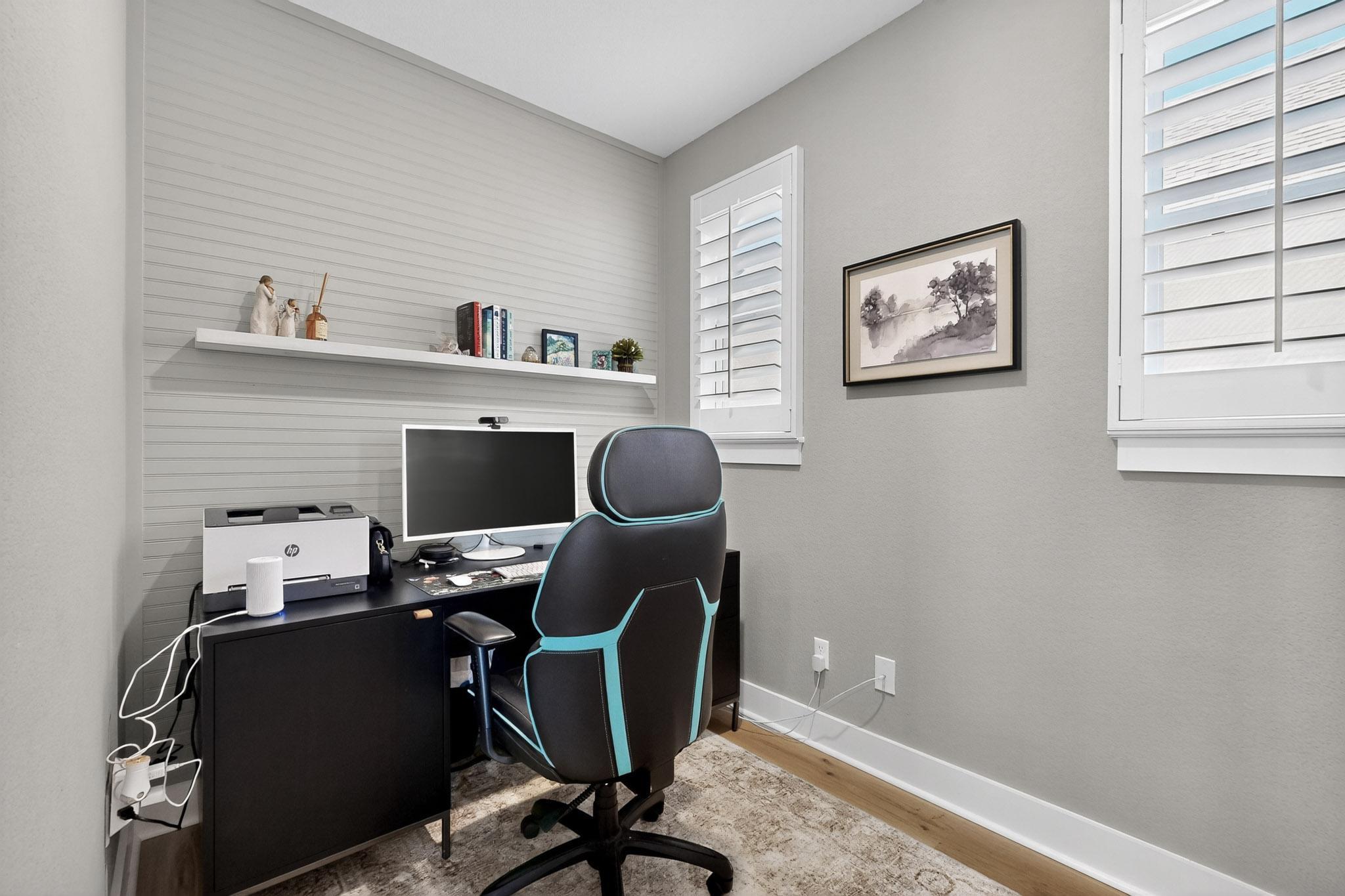 473 Bauer Loop Liberty Hill, TX 78642 - Photo 28 of 38 Office nook with baseboards and light wood-style floors