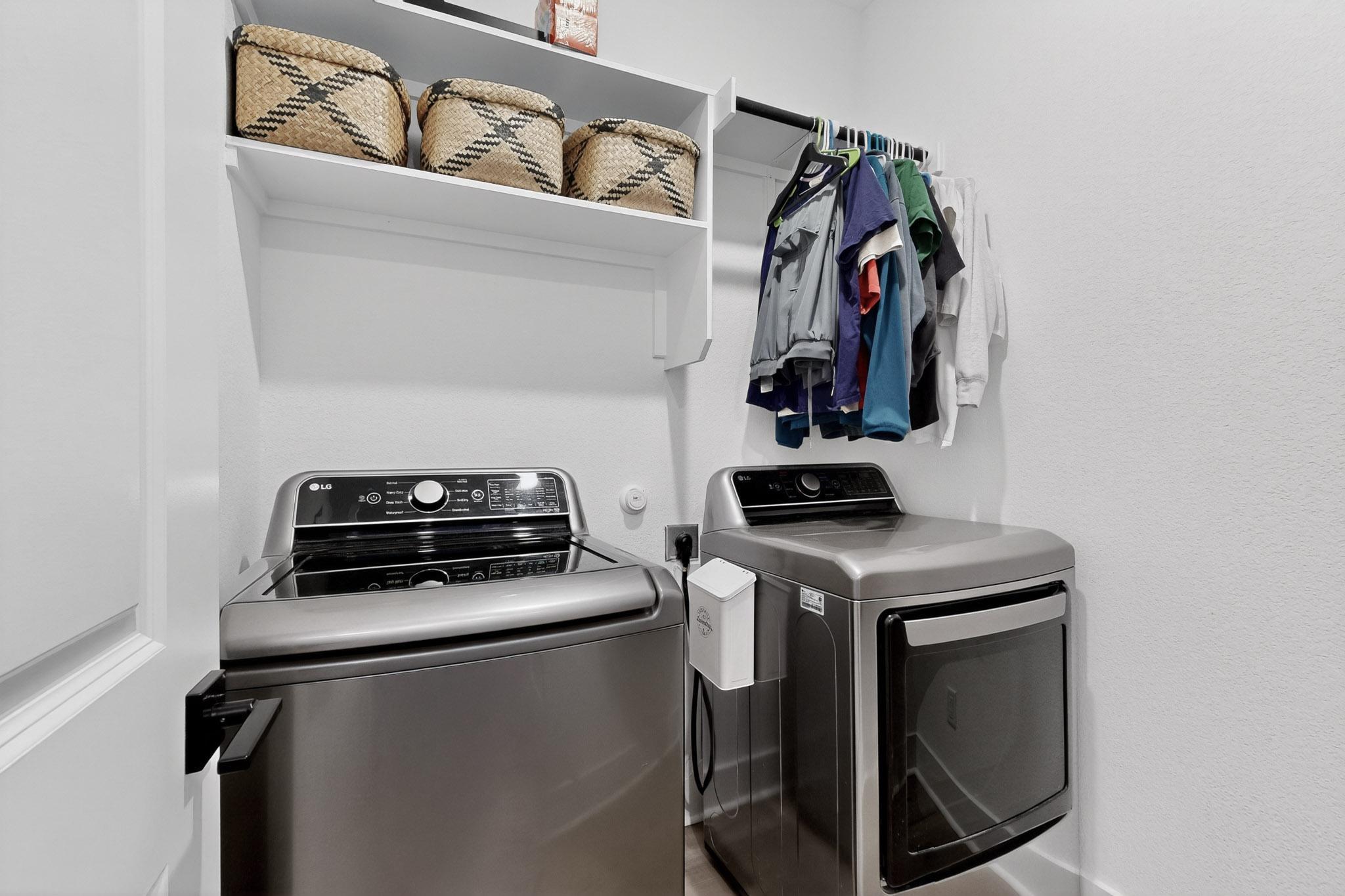 473 Bauer Loop Liberty Hill, TX 78642 - Photo 30 of 38 Laundry Room has shelving